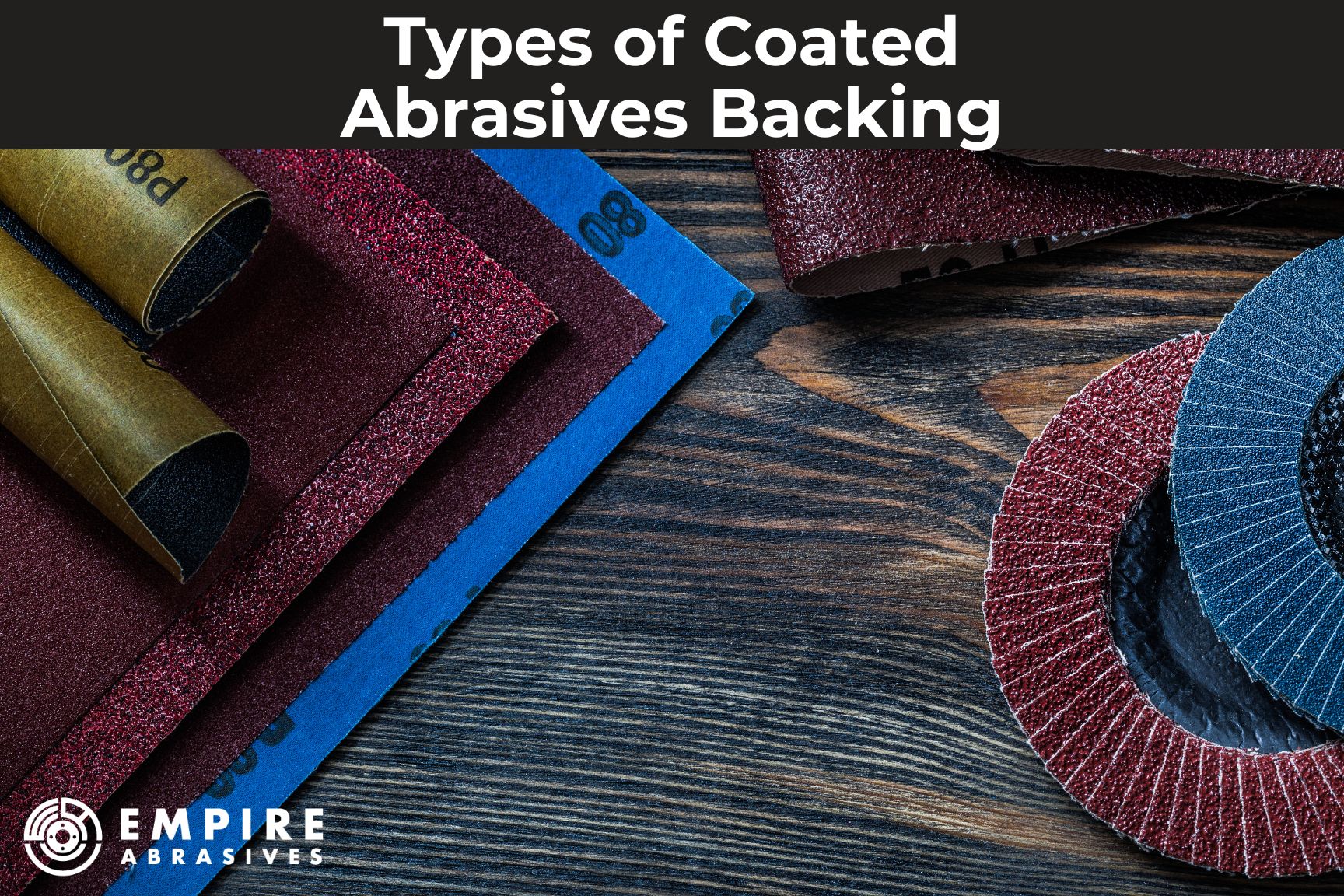 Image of various types of coated abrasive backings displayed on a wooden table. The backings include paper, cloth, film, vulcanized fiber, and non-woven materials. Each type of backing has its own advantages and disadvantages, making it suitable for different sanding and grinding applications.