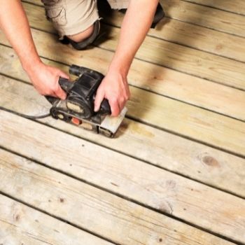 Handheld belt sanders are great for sanding wooden decks