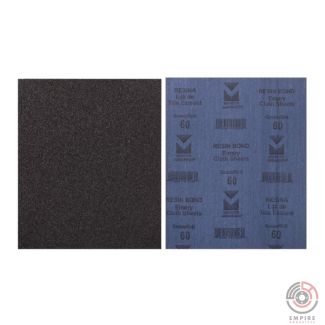 Close-up view of two sheets of latex coated cloth-backed emery cloth sandpaper. This commonly used abrasive features coarse grit particles adhered to a flexible cloth backing, ideal for sanding metal, wood, and other materials.