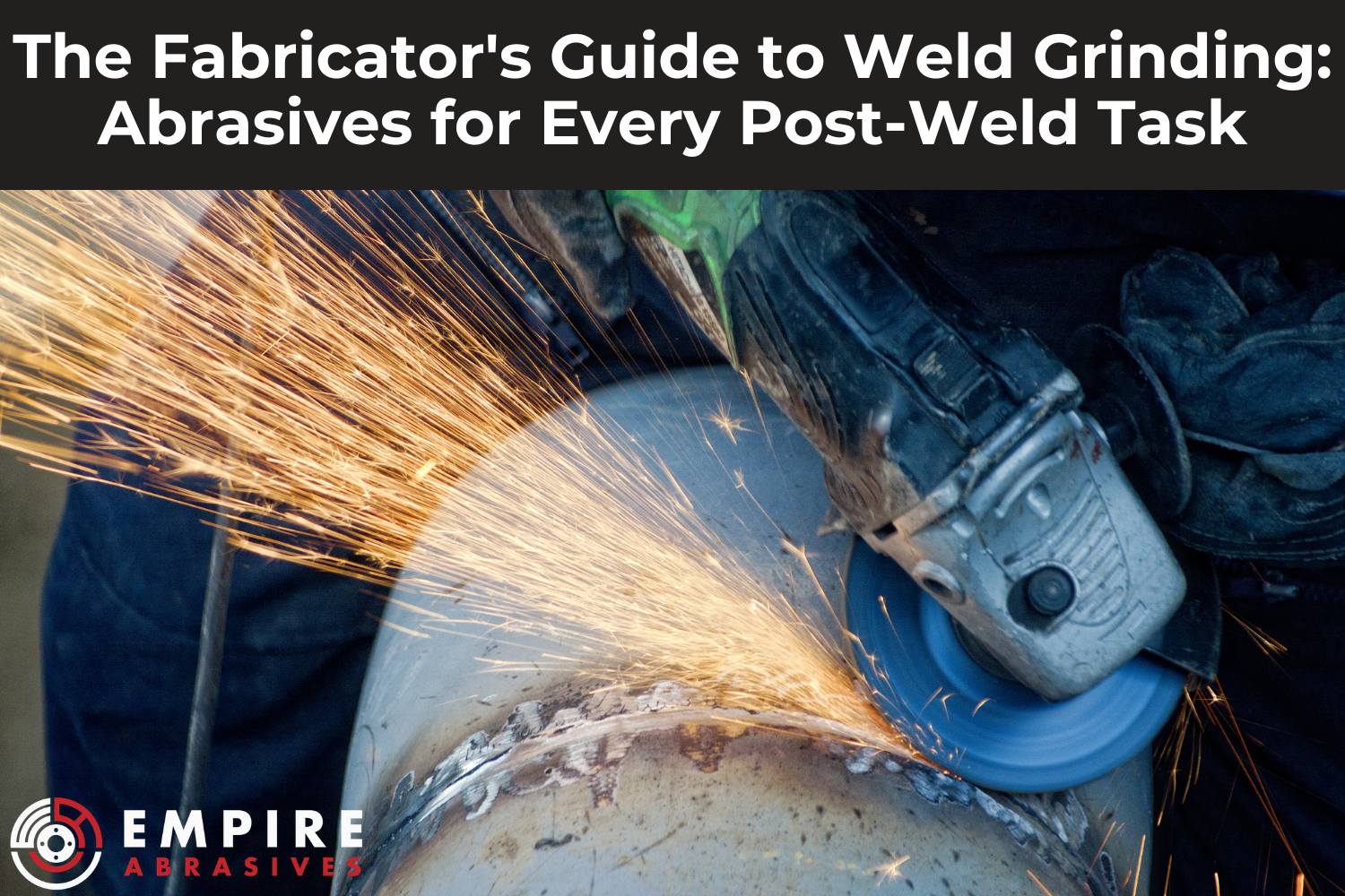 An angle grinder with an abrasive disc sparks as it grinds a heavy weld on a metal surface.