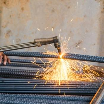 Oxy-Acetylene Torch cutting through rebar steel