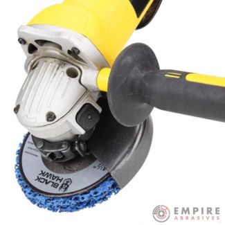 Blue 4.5" strip disc on angle grinder efficiently removing paint from auto body for surface prep"