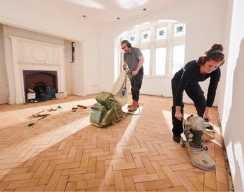 Sanding hardwood floors with floor sanders